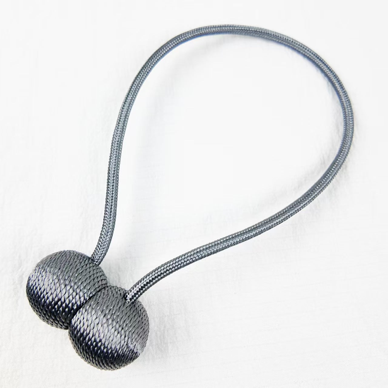Magnetic curtain drawstring