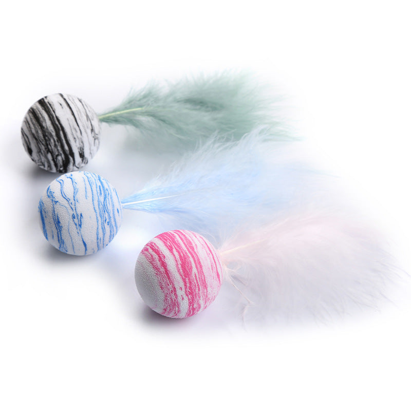 Toy balls with feathers