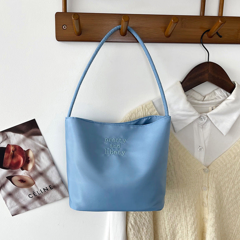 Embroidered letter fashionable handbag