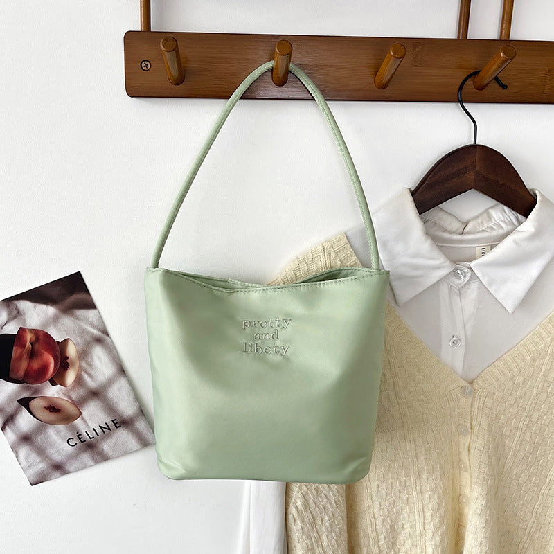 Embroidered letter fashionable handbag