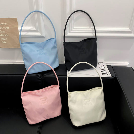 Embroidered letter fashionable handbag