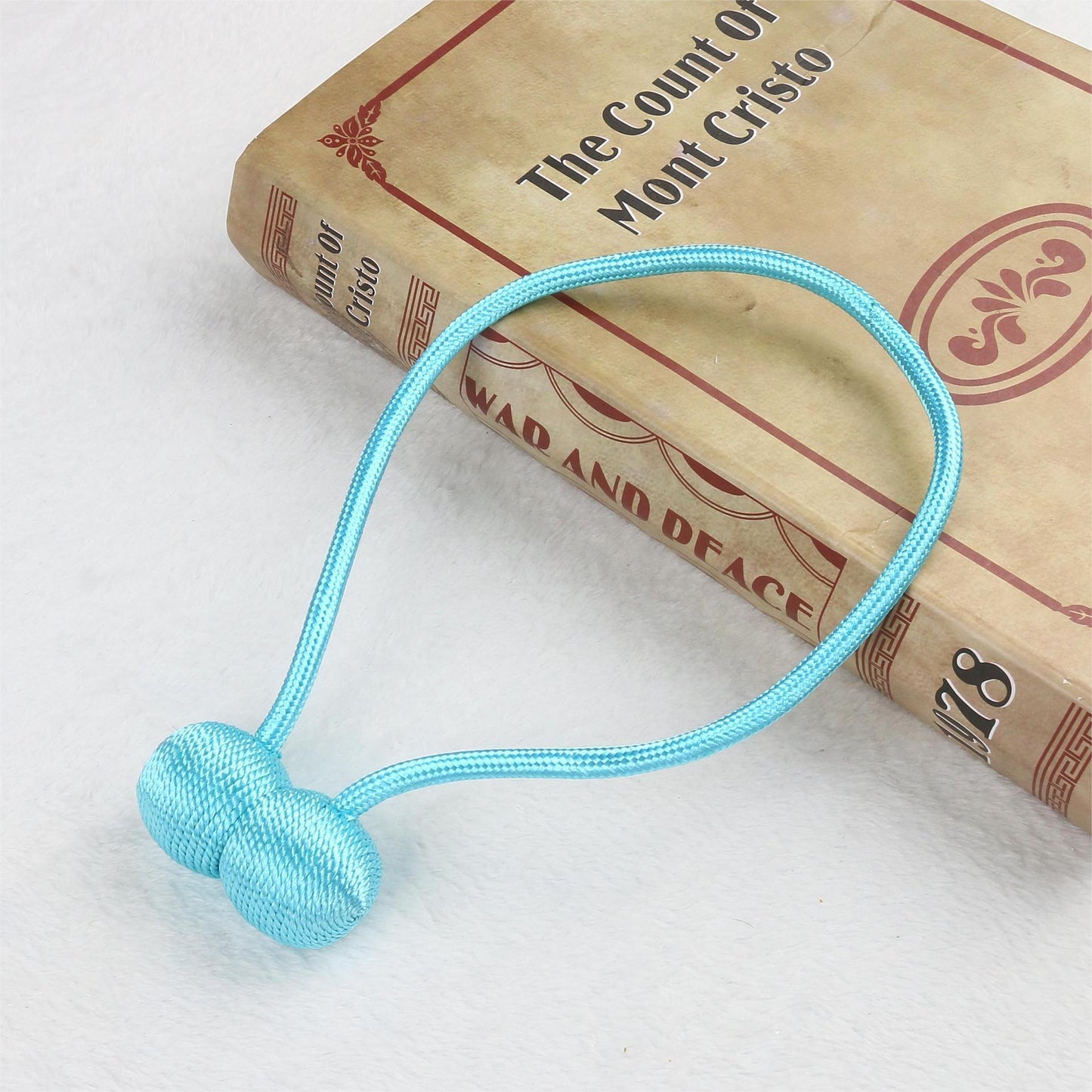 Magnetic curtain drawstring