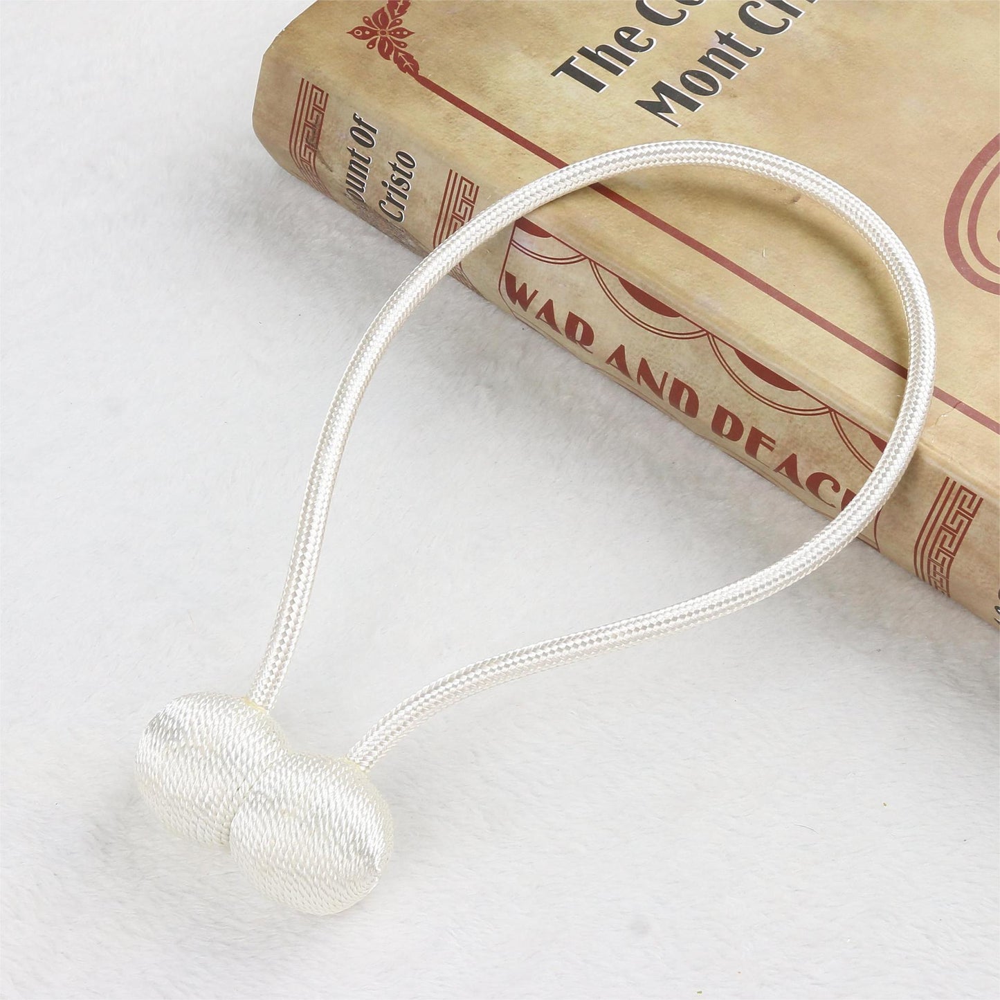 Magnetic curtain drawstring