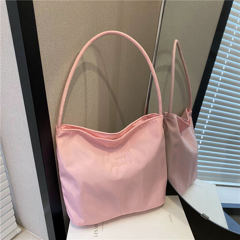 Embroidered letter fashionable handbag