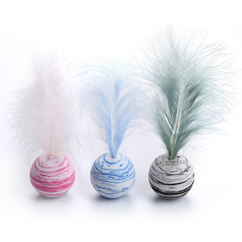 Toy balls with feathers
