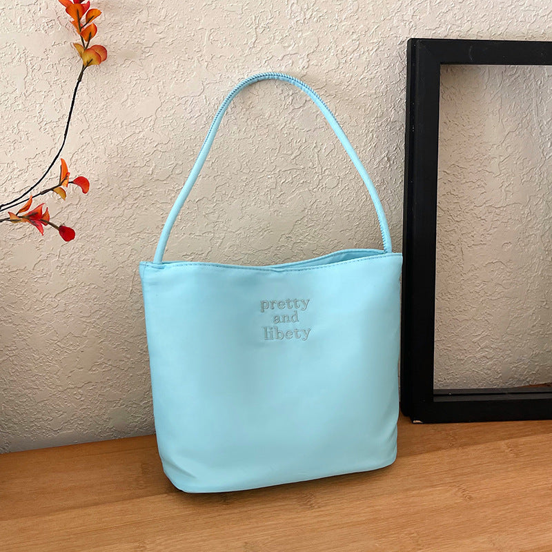 Embroidered letter fashionable handbag