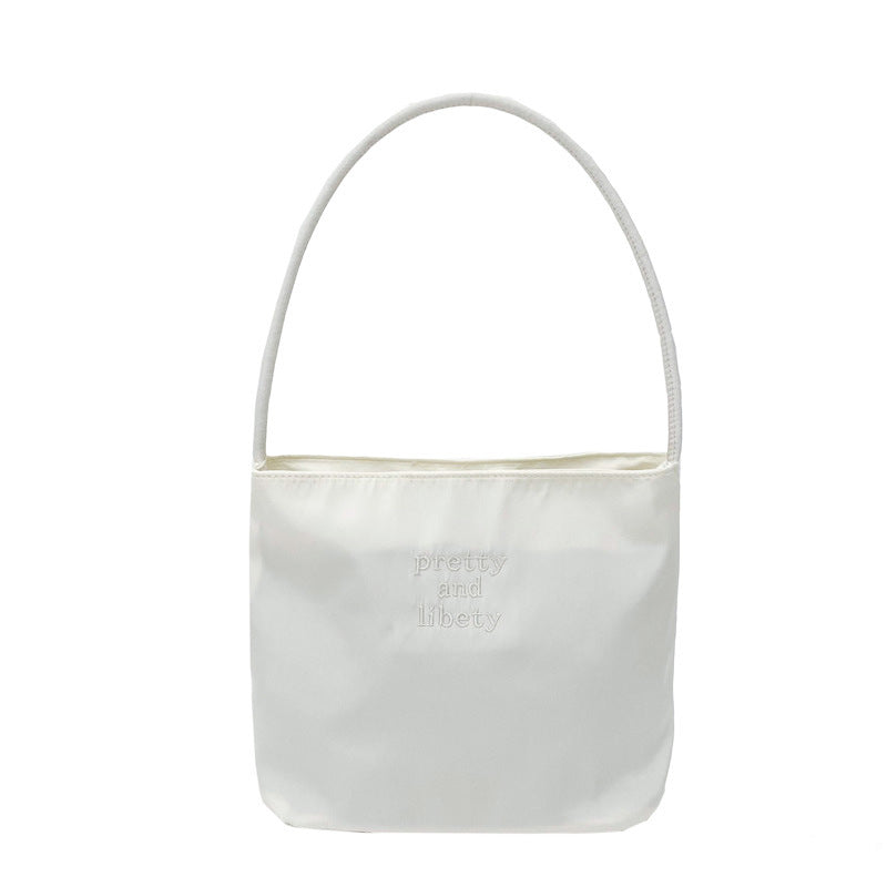 Embroidered letter fashionable handbag